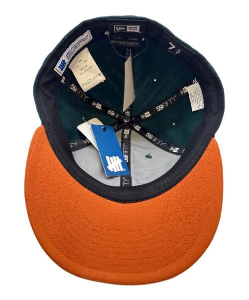 New Era（ニューエラ）New Era (ニューエラ) UNDEFEATED (アンディフィーテッド) New Era　UNDEFEATED　59FIFTY　キャップ グリーン×オレンジ 未使用品の古着・服飾アイテム
