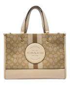 COACHコーチ）の古着「COACH　デンプシー キャリーオール　ハンドバッグ」｜ベージュ