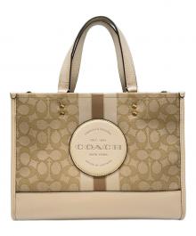 COACH（コーチ）の古着「COACH　デンプシー キャリーオール　ハンドバッグ」｜ベージュ