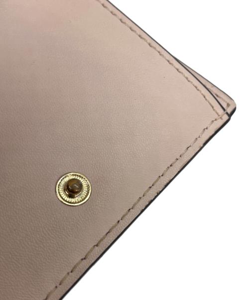MICHAEL KORS（マイケルコース）MICHAEL KORS (マイケルコース) MICHAEL KORS 　3つ折り財布 ベージュ×ピンクの古着・服飾アイテム
