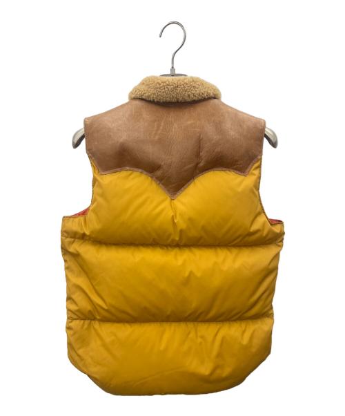 Rocky Mountain FeatherBed（ロッキーマウンテンフェザーベッド）Rocky Mountain FeatherBed (ロッキーマウンテンフェザーベッド) Rocky Mountain Featherbed　ダウンベスト ブラウン×オレンジ サイズ:36の古着・服飾アイテム