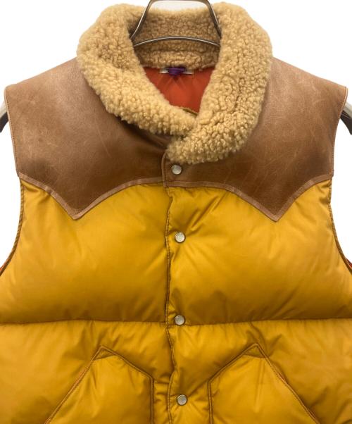 Rocky Mountain FeatherBed（ロッキーマウンテンフェザーベッド）Rocky Mountain FeatherBed (ロッキーマウンテンフェザーベッド) Rocky Mountain Featherbed　ダウンベスト ブラウン×オレンジ サイズ:36の古着・服飾アイテム