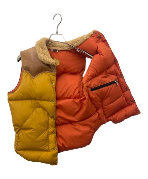 Rocky Mountain FeatherBed（ロッキーマウンテンフェザーベッド）Rocky Mountain FeatherBed (ロッキーマウンテンフェザーベッド) Rocky Mountain Featherbed　ダウンベスト ブラウン×オレンジ サイズ:36の古着・服飾アイテム