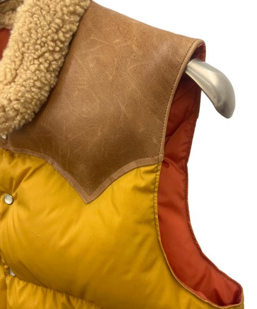 Rocky Mountain FeatherBed（ロッキーマウンテンフェザーベッド）Rocky Mountain FeatherBed (ロッキーマウンテンフェザーベッド) Rocky Mountain Featherbed　ダウンベスト ブラウン×オレンジ サイズ:36の古着・服飾アイテム