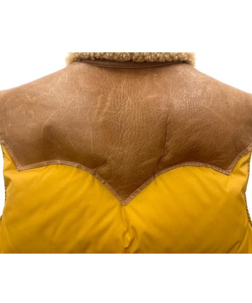 Rocky Mountain FeatherBed（ロッキーマウンテンフェザーベッド）Rocky Mountain FeatherBed (ロッキーマウンテンフェザーベッド) Rocky Mountain Featherbed　ダウンベスト ブラウン×オレンジ サイズ:36の古着・服飾アイテム