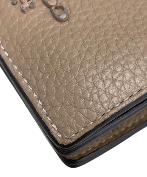 COACH（コーチ）COACH (コーチ) 2つ折り財布 ベージュの古着・服飾アイテム