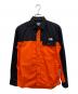 THE NORTH FACE（ザ ノース フェイス）の古着「長袖シャツ」｜オレンジ×ブラック