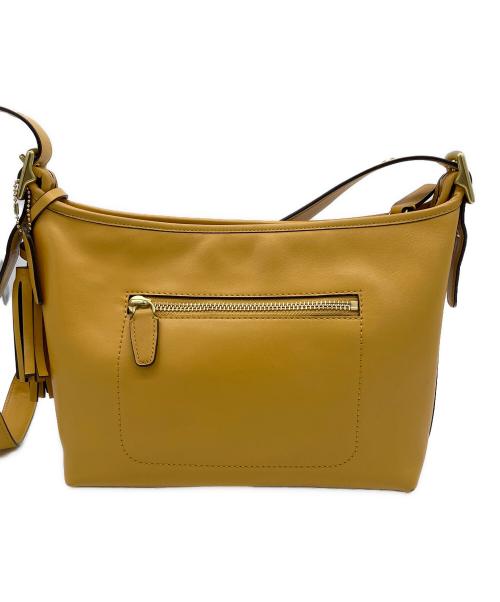 COACH（コーチ）COACH (コーチ) レガシーレザーダッフルショルダーバッグ イエローの古着・服飾アイテム