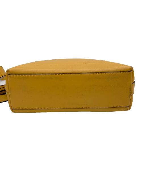 COACH（コーチ）COACH (コーチ) レガシーレザーダッフルショルダーバッグ イエローの古着・服飾アイテム