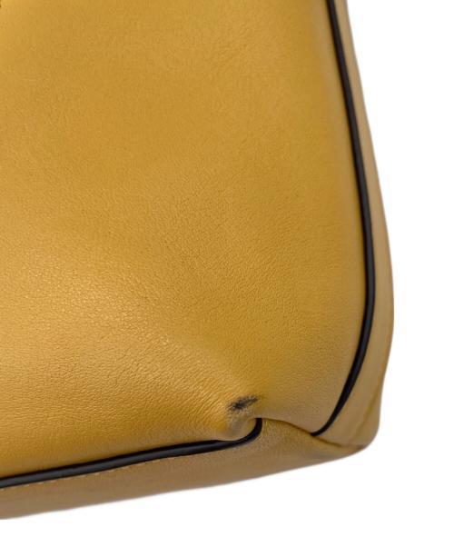 COACH（コーチ）COACH (コーチ) レガシーレザーダッフルショルダーバッグ イエローの古着・服飾アイテム