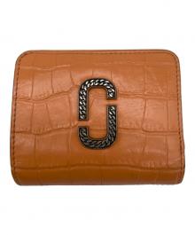 Marc by Marc Jacobs（マークバイマークジェイコブス）の古着「2つ折り財布」｜オレンジ