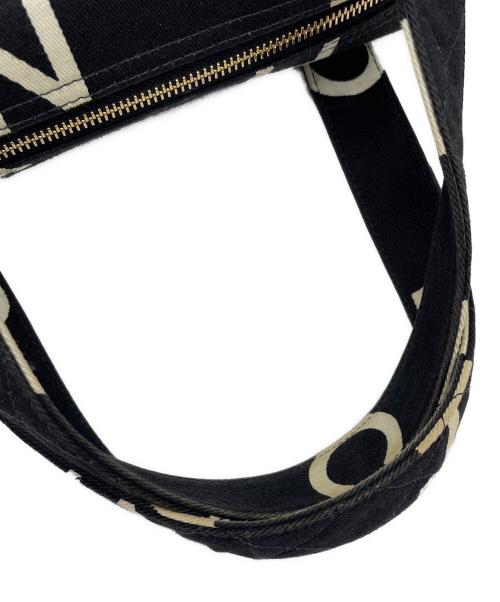 CHANEL（シャネル）CHANEL (シャネル) ロゴキャンバスハンドバッグ ブラック×ホワイトの古着・服飾アイテム