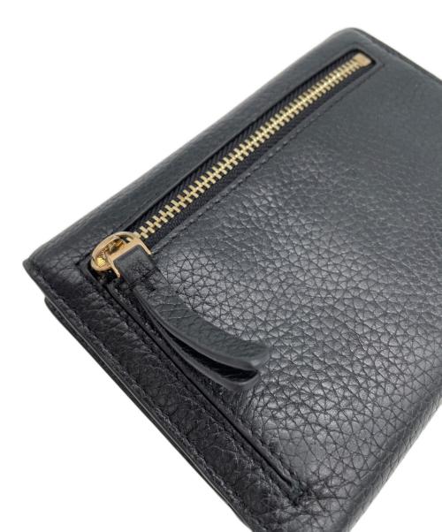 TORY BURCH（トリーバーチ）TORY BURCH (トリーバーチ) Carter Medium Flap Wallet(カーターメディアムフラップウォレット）3つ折り財布 ブラックの古着・服飾アイテム