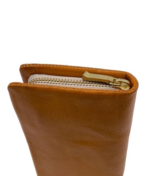 TAKEO KIKUCHI（タケオキクチ）TAKEO KIKUCHI (タケオキクチ) 長財布 オレンジの古着・服飾アイテム