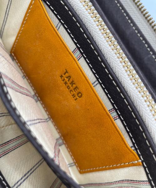 TAKEO KIKUCHI（タケオキクチ）TAKEO KIKUCHI (タケオキクチ) 長財布 オレンジの古着・服飾アイテム