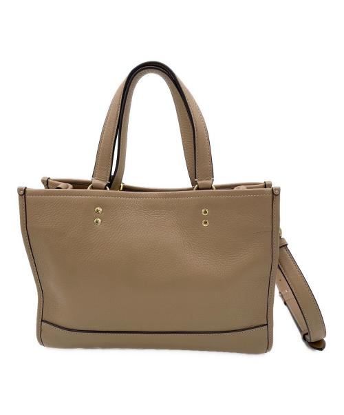 COACH（コーチ）COACH (コーチ) デンプシー キャリーオール ウィズ パッチ　2WAYバッグ ベージュの古着・服飾アイテム