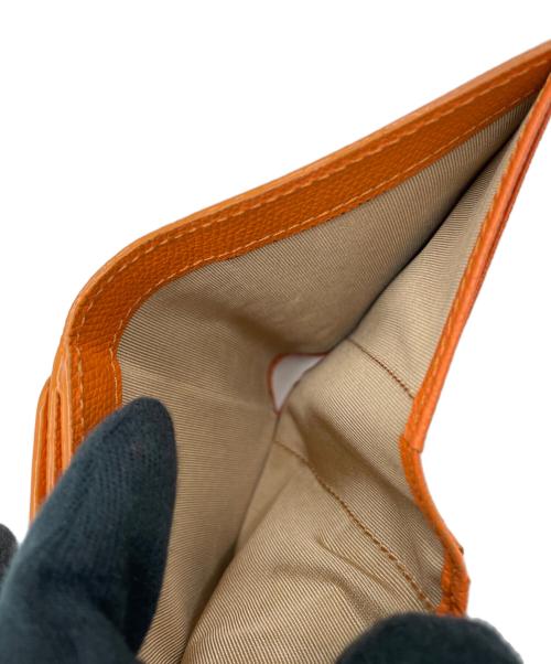 TOPKAPI（トプカピ）TOPKAPI (トプカピ) 2つ折り財布 オレンジの古着・服飾アイテム