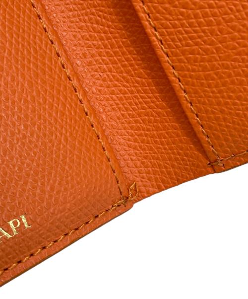 TOPKAPI（トプカピ）TOPKAPI (トプカピ) 2つ折り財布 オレンジの古着・服飾アイテム