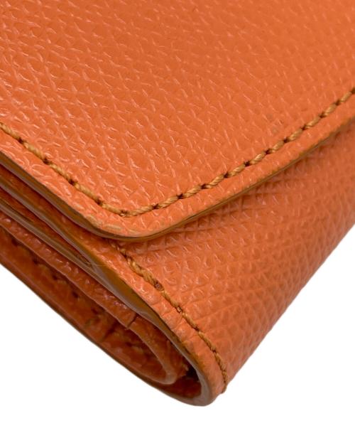 TOPKAPI（トプカピ）TOPKAPI (トプカピ) 2つ折り財布 オレンジの古着・服飾アイテム