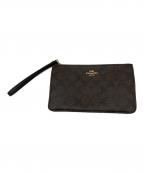 COACHコーチ）の古着「クラッチバッグ」｜ブラウン