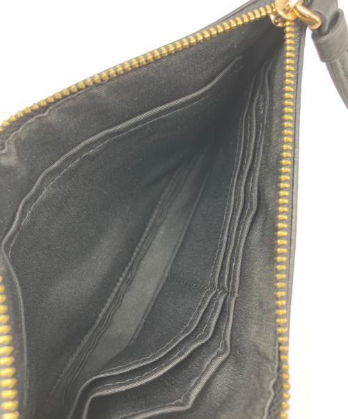 COACH（コーチ）COACH (コーチ) クラッチバッグ ブラウンの古着・服飾アイテム