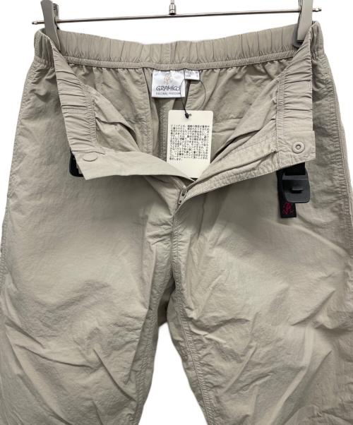 GRAMICCI（グラミチ）GRAMICCI (グラミチ) ナイロンパンツ ベージュ サイズ:ASIA　Mの古着・服飾アイテム