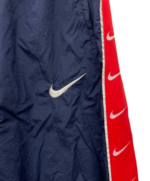 NIKE（ナイキ）NIKE (ナイキ) ナイロンパンツ ネイビー サイズ:Lの古着・服飾アイテム