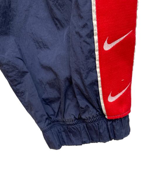 NIKE（ナイキ）NIKE (ナイキ) ナイロンパンツ ネイビー サイズ:Lの古着・服飾アイテム