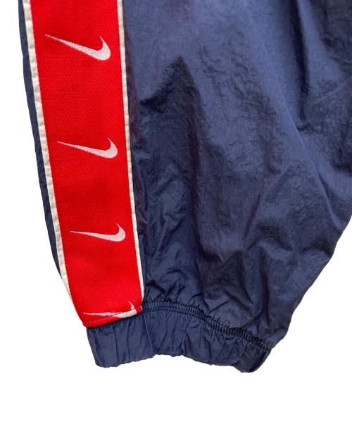 NIKE（ナイキ）NIKE (ナイキ) ナイロンパンツ ネイビー サイズ:Lの古着・服飾アイテム
