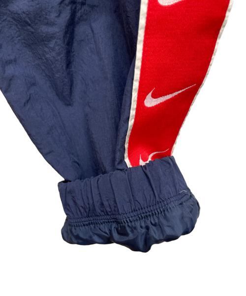 NIKE（ナイキ）NIKE (ナイキ) ナイロンパンツ ネイビー サイズ:Lの古着・服飾アイテム