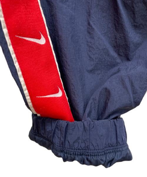 NIKE（ナイキ）NIKE (ナイキ) ナイロンパンツ ネイビー サイズ:Lの古着・服飾アイテム