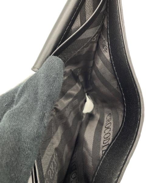 GENUINE CROCODILE SKIN（ジェニュインクロコダイルスキン）genuine crocodile skin (ジェニュインクロコダイルスキン) 2つ折り財布 ブラックの古着・服飾アイテム