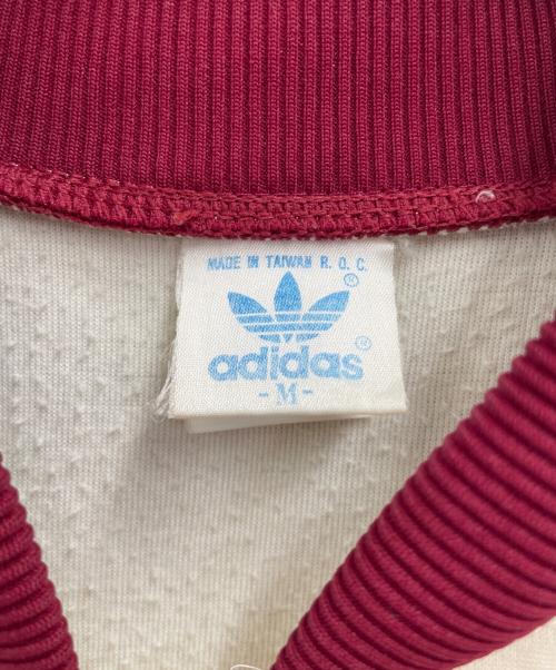 adidas（アディダス）adidas (アディダス) トラックジャケット レッド×アイボリー サイズ:Mの古着・服飾アイテム