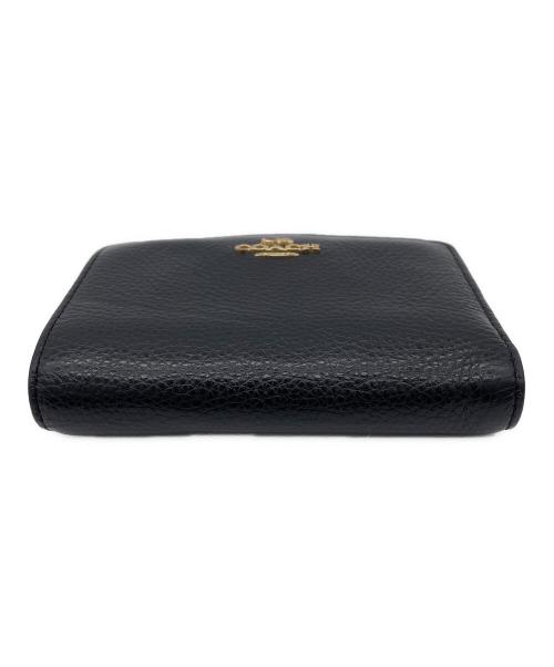 COACH（コーチ）COACH (コーチ) キスロック ミディアム ウォレット　2つ折り財布 ブラックの古着・服飾アイテム