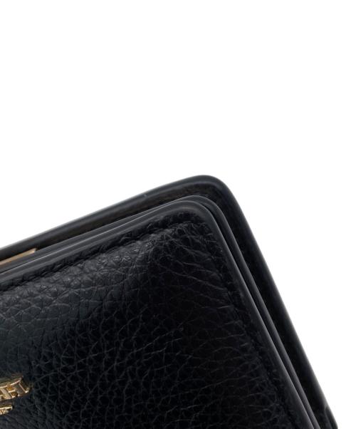 COACH（コーチ）COACH (コーチ) キスロック ミディアム ウォレット　2つ折り財布 ブラックの古着・服飾アイテム