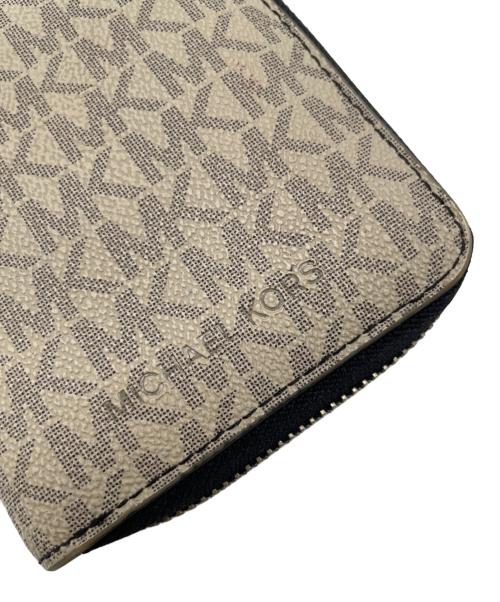 MICHAEL KORS（マイケル・コース）MICHAEL KORS (マイケル・コース) 長財布 ベージュの古着・服飾アイテム