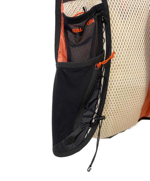 SALOMON（サロモン）SALOMON (サロモン) ACTIVE SKIN 12W　ランニングベスト ベージュ×ブラック サイズ:XSの古着・服飾アイテム
