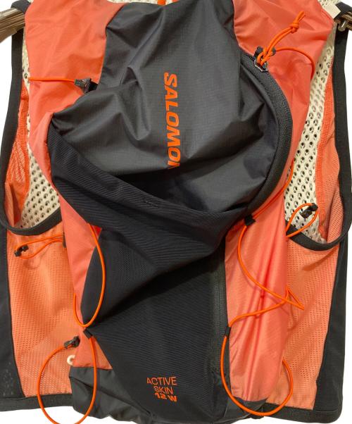 SALOMON（サロモン）SALOMON (サロモン) ACTIVE SKIN 12W　ランニングベスト ベージュ×ブラック サイズ:XSの古着・服飾アイテム
