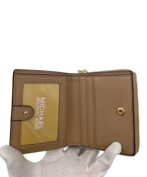 MICHAEL KORS（マイケル・コース）MICHAEL KORS (マイケル・コース) 2つ折り財布の古着・服飾アイテム
