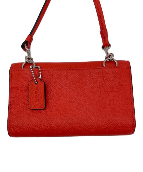 COACH（コーチ）COACH (コーチ) 三つ折り財布 オレンジの古着・服飾アイテム