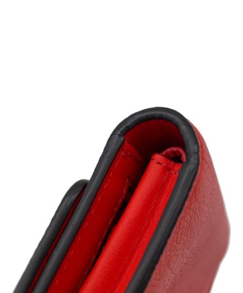 COACH（コーチ）COACH (コーチ) 三つ折り財布 オレンジの古着・服飾アイテム