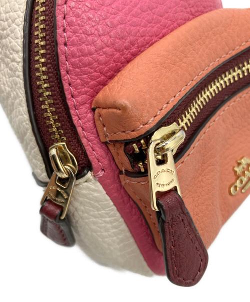 COACH（コーチ）COACH (コーチ) チャーム ピンク×オレンジの古着・服飾アイテム