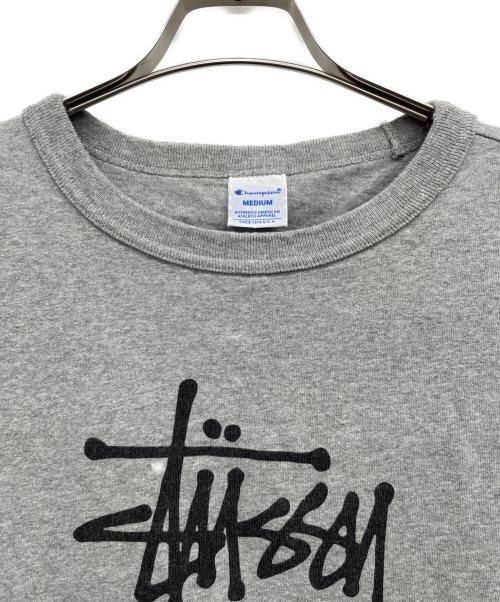 Champion（チャンピオン）Champion (チャンピオン) stussy (ステューシー) 半袖カットソー グレー サイズ:MEDIUMの古着・服飾アイテム