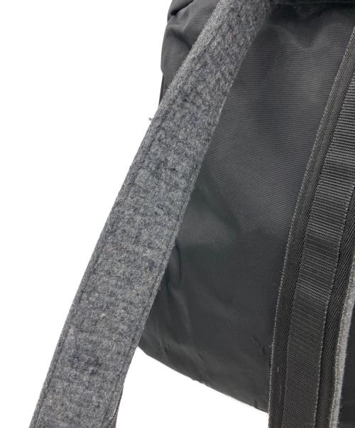 WHITE MOUNTAINEERING（ホワイトマウンテ二アニング）WHITE MOUNTAINEERING (ホワイトマウンテ二アニング) リュック ブラックの古着・服飾アイテム