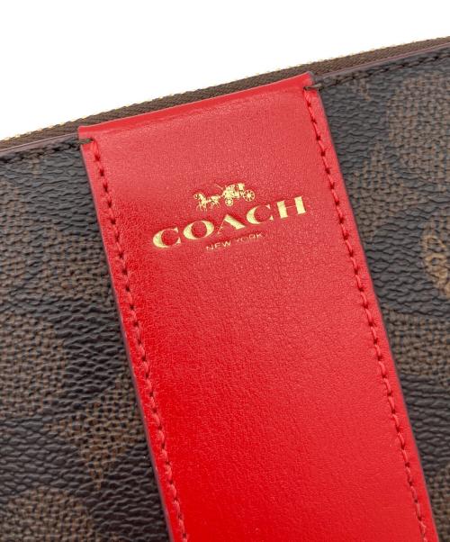 COACH（コーチ）COACH (コーチ) コーナージップリストレット ポーチ ブラウンの古着・服飾アイテム
