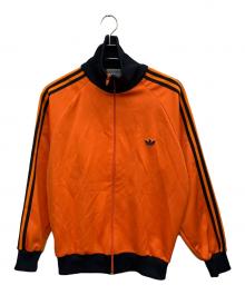 adidas（アディダス）の古着「ジャージトップ」｜オレンジ