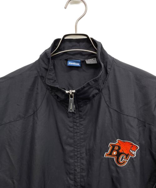REEBOK（リーボック）REEBOK (リーボック) BC LIONS ジャケット ブラック×オレンジ サイズ:Mの古着・服飾アイテム
