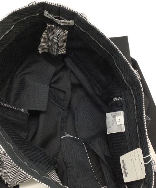CMMN SWDN（コモンスウェーデン）CMMN SWDN (コモンスウェーデン) パンツ ブラック×ホワイト サイズ:46 未使用品の古着・服飾アイテム