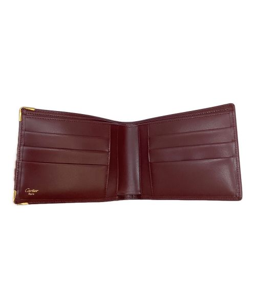 Cartier（カルティエ）Cartier (カルティエ) 2つ折り財布 ボルドーの古着・服飾アイテム