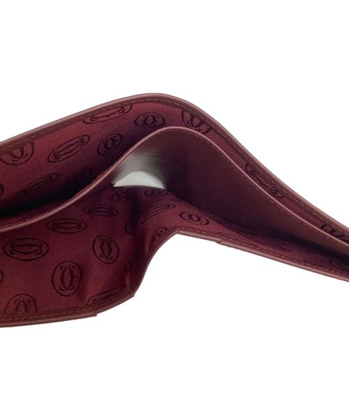 Cartier（カルティエ）Cartier (カルティエ) 2つ折り財布 ボルドーの古着・服飾アイテム